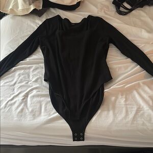 Women’s black body suit